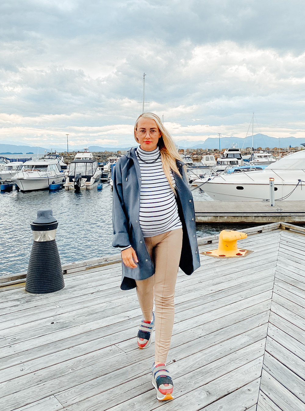 pregnant woman with a raincoat