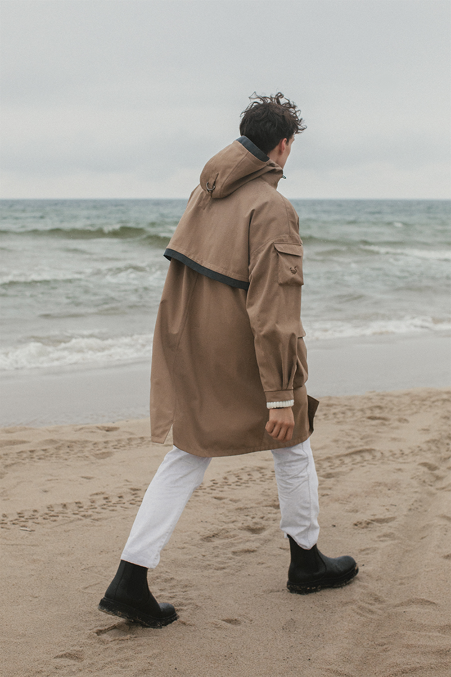 raincoat, walking by the sea